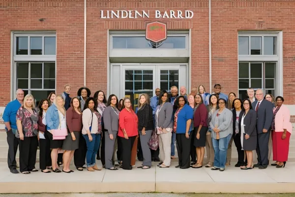 A group of faculty and staff from Lindsay Bard School of Education, alongside the Linden Board of Education Payroll Calendar